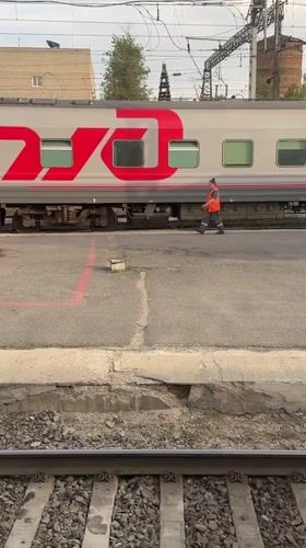 Train passenger documents rail journey through Krasnodar countryside