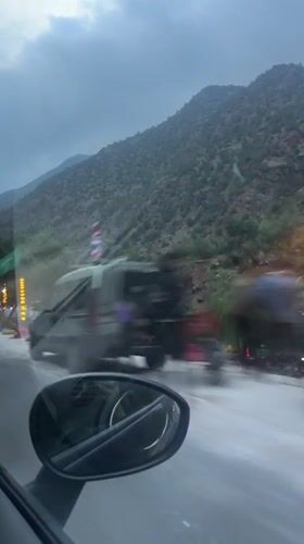 Evening drive through green mountains near Iraght, Morocco
