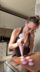 Woman bakes macarons in Tel Aviv kitchen Tuesday afternoon