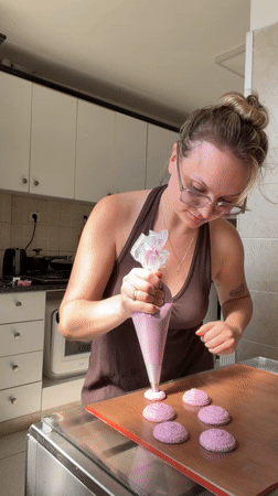 Woman bakes macarons in Tel Aviv kitchen Tuesday afternoon
