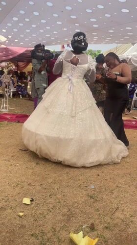 Wedding celebration held under decorated tent in Shen, Nigeria