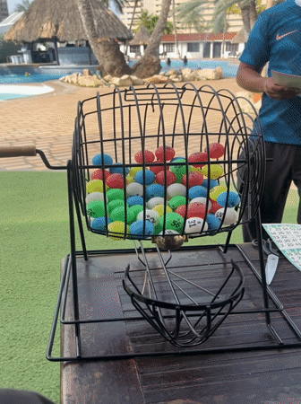 Outdoor bingo game by the pool in Porlamar, Venezuela