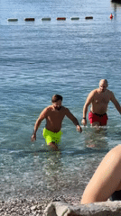 Early morning beach activity captured in Budva, Montenegro