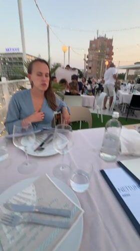 Outdoor dining moment at a Rimini restaurant table