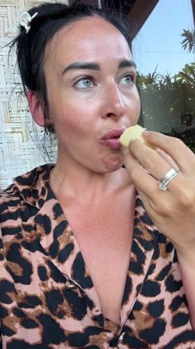 Woman in leopard print relaxes outdoors in Bali