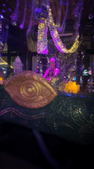 Nightclub event with DJ and purple-lit beachside area in Thailand