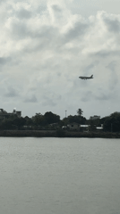 Thailand coastal communities witness plane landing, rainbow amid storms