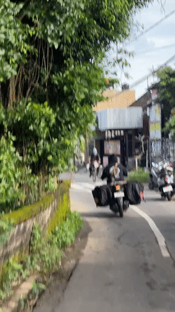 Morning motorcycle journey documented through Sukawati village streets