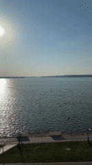 Sunny day captured at Votkinsk waterway with bright reflections