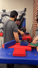 Arm wrestling training session held at Moscow gym