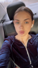 Woman in blue hoodie observed in car backseat, Пихтовка