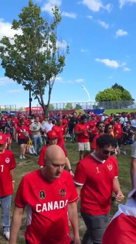 Canada soccer fans gather in red shirts in Toronto