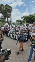 Protesters march in Caracas demanding release of political prisoners