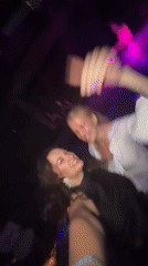 Women dance at colorful nightclub in North Kuta