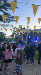 Evening market and live music festival with food and craft vendors