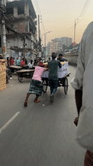 Everyday street scenes captured during midday in Dhaka, Bangladesh