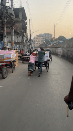 Everyday street scenes captured during midday in Dhaka, Bangladesh