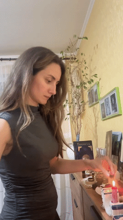 Woman practices meditation in Kryvyi Rih home evening session