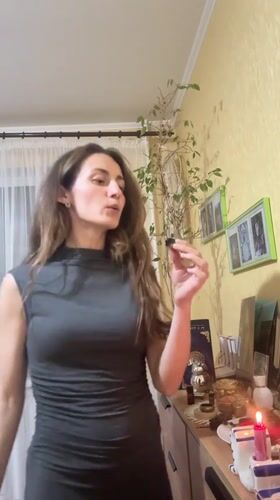 Woman practices meditation in Kryvyi Rih home evening session