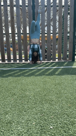 Two women prepare for pull-up workout at Kiryat Bialik park