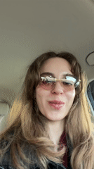Woman eating lollipop in car captured in Moscow