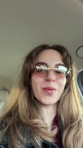 Woman eating lollipop in car captured in Moscow