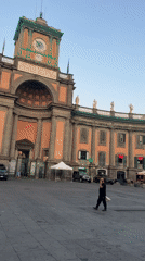 Afternoon foot traffic across Naples' grand historic squares