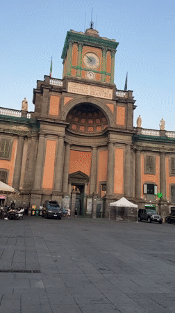 Afternoon foot traffic across Naples' grand historic squares