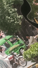 Morning street life and damaged vehicle documented in Samundri