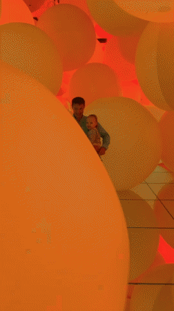Families visit immersive digital art museum in Koto, Japan