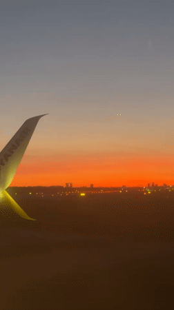 Ryanair aircraft lands at Copenhagen Kastrup during sunset