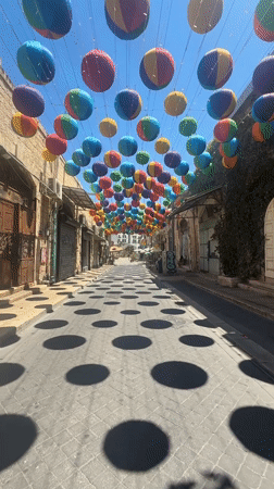 Tel Aviv street market: hanging decor, wooden carvings, antique rings