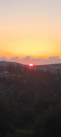 Vibrant red sunset captured over Lachish Regional Council, Israel