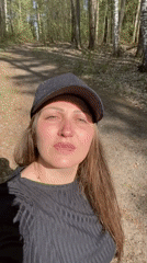 Woman photographed in wooded area in Noviy, Russia