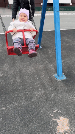 Everyday family moments captured across Tobolsk playground and residential areas