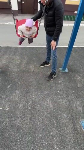 Everyday family moments captured across Tobolsk playground and residential areas