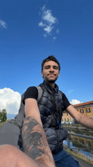 Cyclist travels scenic canal path in Bonirola, Italy