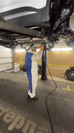 Automotive maintenance and parking activities observed in Izhevsk