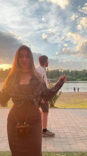 Friends goofing around by the water in Krasnoyarsk