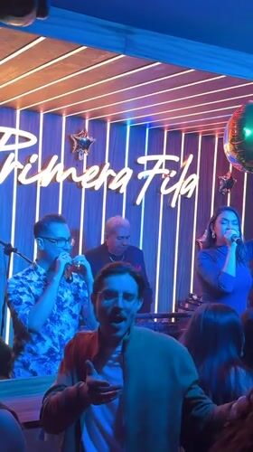 Late-night karaoke and live music documented at Mexican venue
