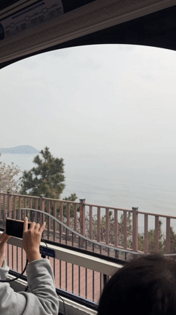 Late-night coastal transportation activity captured in Busan