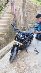 Street life and hillside sprawl across a September morning in Aizawl