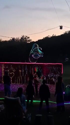 Evening bubble show entertains families in Montenegro village