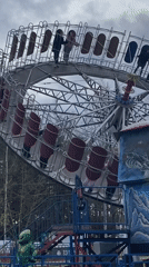 Amusement park operates under spring skies in Chaikovsky, Russia