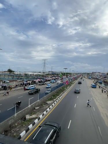 Daily street life documented across Lekki, Nigeria during evening hours