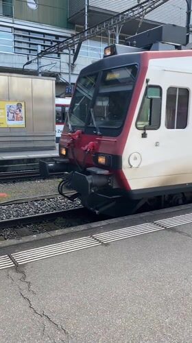 SBB train departs Luzern station platform