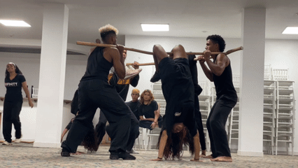 Dance group rehearses acrobatic and stick routines in Porlamar studio