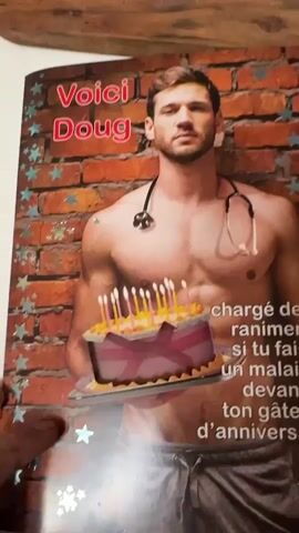 Here is a detailed description of the video:

The video displays the interior of a personalized birthday card. The card features two separate pages, each showcasing a photograph of a man holding a cake. On the left page, there is a shirtless man with a stethoscope, labeled "Doug," seemingly offering medical assistance if one were to fall ill near the birthday cake. The right page presents a man in sunglasses and a leather jacket, holding a cake and tagged as "Georges," who is tasked with delivering the cake. A "What else?" caption is added, implying that Georges may bring something beyond just cake. The card is filled with signatures and birthday wishes written in blue ink.