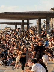 Crowds gather at Tel Aviv Marina promenade Saturday afternoon