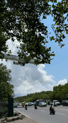 Malaysia Airlines plane makes low landing approach over Kuta road
